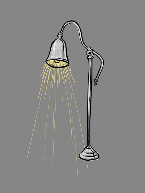 Curved floor lamp casting yellow light on a grey background